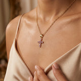 pink stone cross necklace set in gold with gold chain
