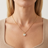 Clear Stone Heart Necklace set in Gold w/ gold chain