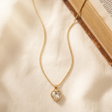 Clear Stone Heart Necklace set in Gold w/ gold chain